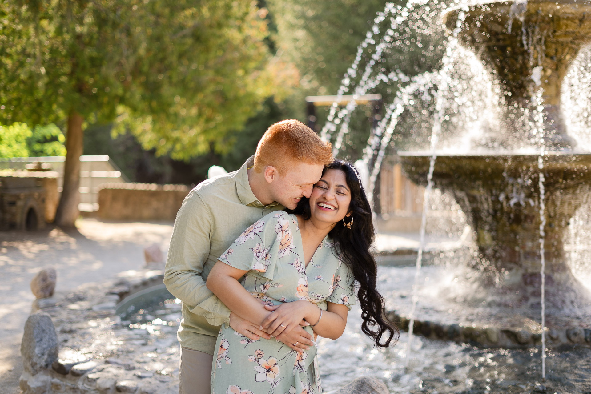 Engagement Photo in front of fountain at Belfountain Conservation Area